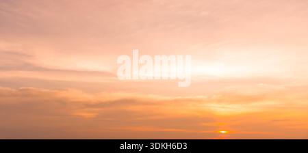 Beautiful morning or evening red or orange sky with cloudy while sunsets or sunrises was taken at the sea used as natural background texture Stock Photo