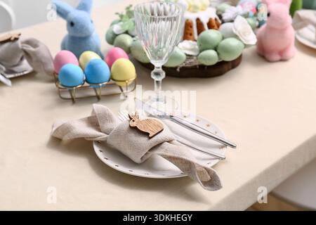 Table setting with Easter eggs, closeup Stock Photo