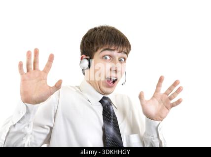 Shocked Young Man With Headset. Isolated on the White Background Stock Photo