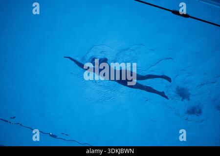 A swimmer swims at the Sky Pool. The Sky Pool at Embassy Gardens in ...