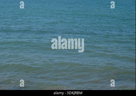 Sea floor stock photo. Smooth Pacific Ocean with blue color. Stock Photo