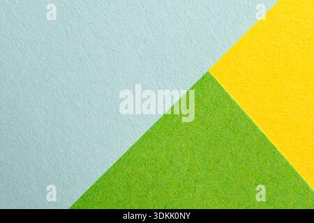 Colorful triangles of blue, green, and yellow create a lively atmosphere. Stock Photo
