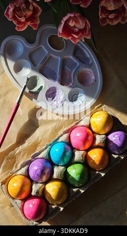 Tulips, Painted Easter Eggs Still Life, top view, Easter holidays, spring, . High quality photo Stock Photo