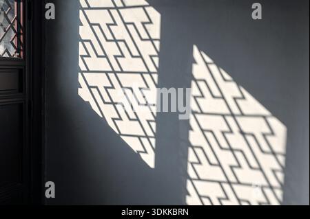 Silhouette with traditional Chinese pattern on the wall Stock Photo