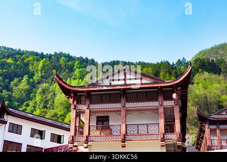 Chongqing China 4.7.2025. Traditional Chinese pagoda tower with curved tiled roofs Stock Photo