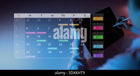 Project Management and Schedule Planning Displayed on a Digital Calendar Interface. Stock Photo