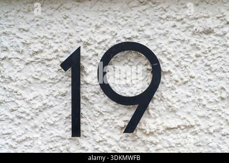 Black number 19 on a white background Stock Photo