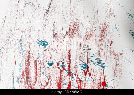 Blue watercolor paint with strokes and spots and red on white paper as background and wallpaper, watercolor wave paint Stock Photo