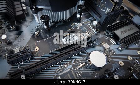 Sarajevo, Bosnia and Herzegovina – January 25, 2026: M.2 solid state drive installed on a motherboard during desktop computer assembly, amid rising SS Stock Photo