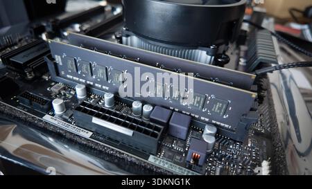 Sarajevo, Bosnia and Herzegovina – January 25, 2026: Installed RAM memory module seated in motherboard slot inside desktop computer during a period of Stock Photo