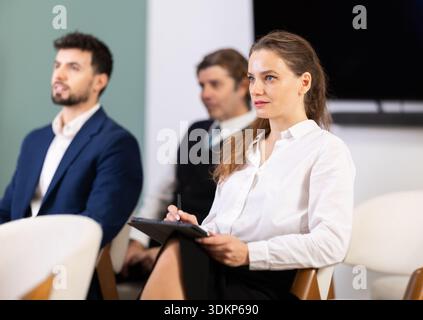 Group of businessmen participating in professional training class Stock Photo