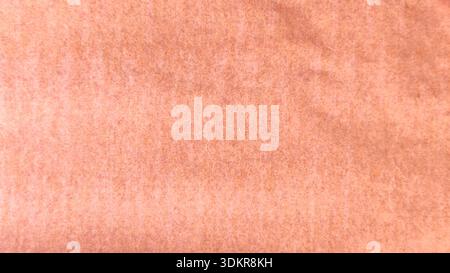Pale Peach Orange Paper Texture Background with Subtle Grain and Warm Soft Pastel Tone for Minimalist Backdrop Stock Photo