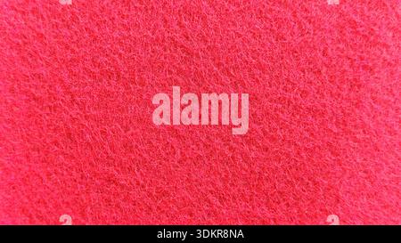High Angle Macro Texture of Bright Red Synthetic Fiber Material for Abstract Background Stock Photo