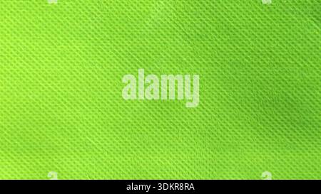 Close Up Texture of Lime Green Eco Friendly Reusable Grocery Bag Material for Sustainable Concept Background Stock Photo
