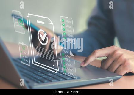 checklist Complete the performance review digital form checklist.business people using evaluation questionnaire evaluation Stock Photo