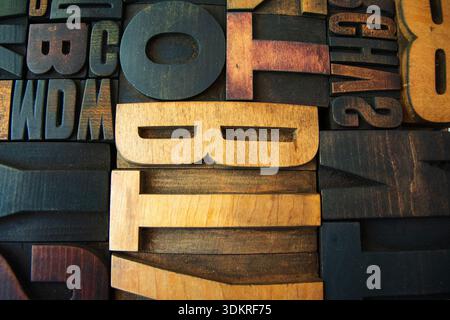 A collection of assorted wooden letterpress printing blocks Stock Photo