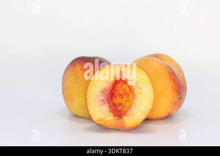 ripe peaches isolated on white Stock Photo