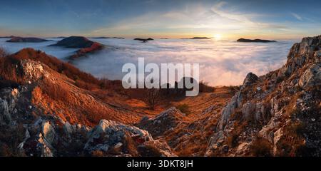 Above clouds - mountain landscape at sunset, Slovakia Stock Photo