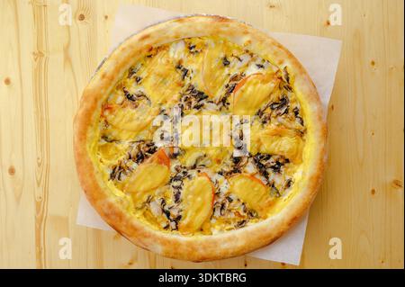 Italian pizza with ham and vegetables Stock Photo