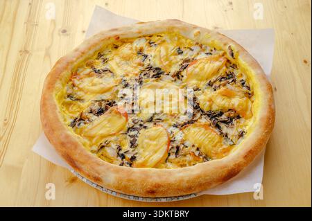Italian pizza with ham and vegetables Stock Photo