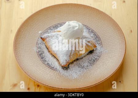 apple strudel with a scoop of vanilla ice cream Stock Photo