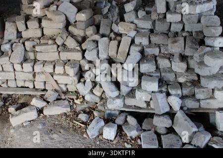 Stack of Old Concrete Bricks in Abandoned Structure Stock Photo