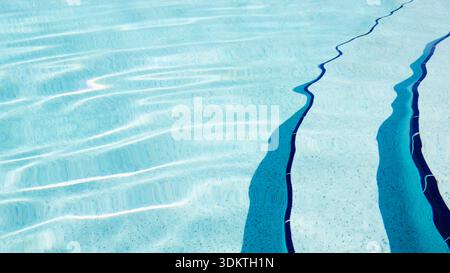 Swimming pool steps and crystal water Stock Photo
