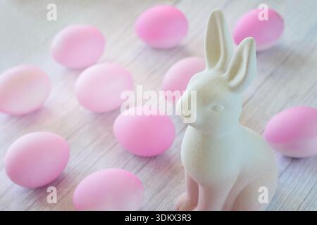 Ceramic Easter bunny and pink eggs Stock Photo