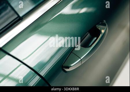 The handle on the car door from the outside. High quality photo Stock Photo
