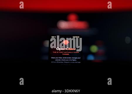 Website homepage for OpenClaw, an AI assistant tool, featuring a red robot mascot on a dark background. High quality photo Stock Photo