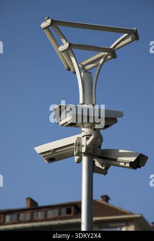 Security camera record live, Security camera on blue sky background Stock Photo