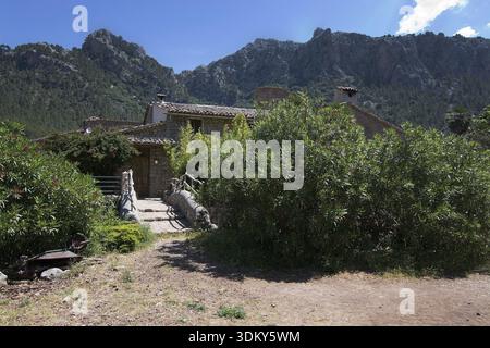 MALLORCA, SPAIN - MAY 15, 2017: Rustic building details in green subtropical garden in the Tramuntana mountains on May 15, 2017 in Mallorca, Spain Stock Photo