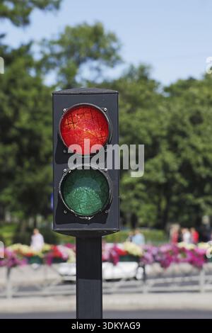 Two-color lights on a city street in summer Stock Photo