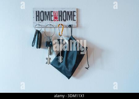 the keys hanging on the wall in the entrance hall Stock Photo