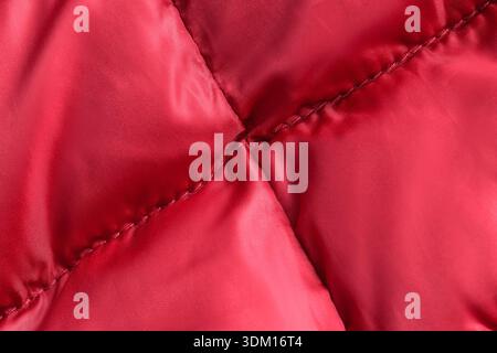 Red stitched waterproof fabric closeup as a background Stock Photo