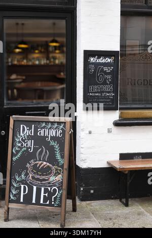 Pub with pie sign Stock Photo