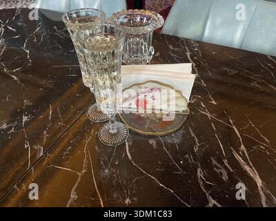 transparent glasses on the table in restaurant Stock Photo