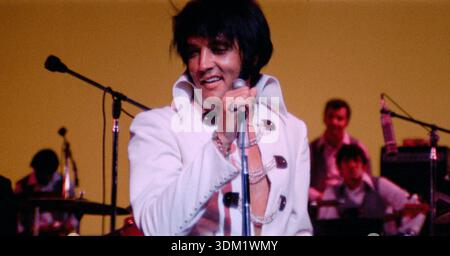EPiC: Elvis Presley in Concert (2025) directed by Baz Luhrmann and starring Elvis Presley. A groundbreaking cinematic experience blending unseen concert footage, restored outtakes, and Elvis's own unheard life story audio. Publicity still EDITORIAL USE ONLY. Credit: BFA / Neon / Universal Pictures Stock Photo