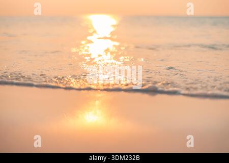 Beach shore golden sun reflection waves closeup stunning breathtaking tropical paradise travel destination. Artistic ocean water surface bright calm Stock Photo