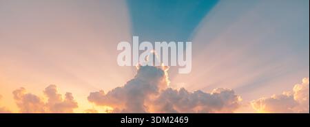 Majestic sunset sky gold orange clouds sun rays beams panoramic wallpaper breathtaking atmospheric nature landscape horizon scenic cinematic sunlight Stock Photo