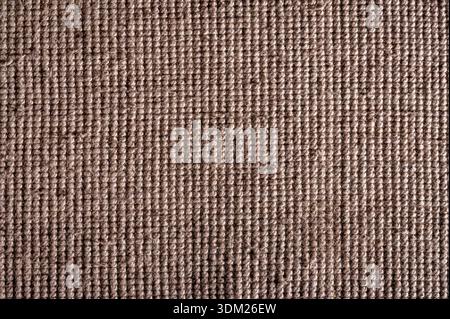 Brown carpet fabric showing textured surface creating a repeating pattern for backgrounds Stock Photo