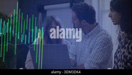 Discussing team gathered around laptop in meeting, candlestick overlay left, flipchart, glasses Stock Photo