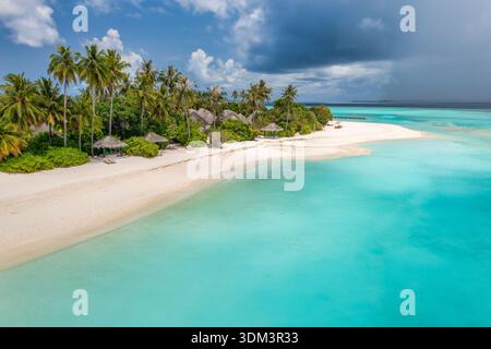 Aerial tropical island beach stormy clouds overcast sky idyllic before storm nature scenic Stock Photo