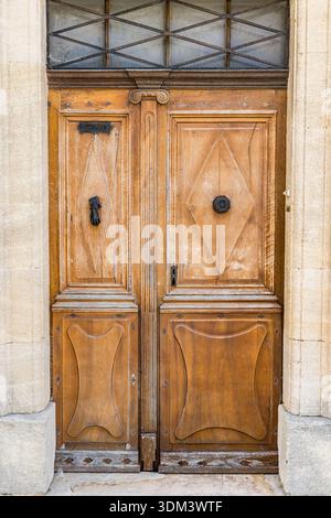 Old house shutters and door on stone wall Provence charming rustic architecture detail French countryside Stock Photo