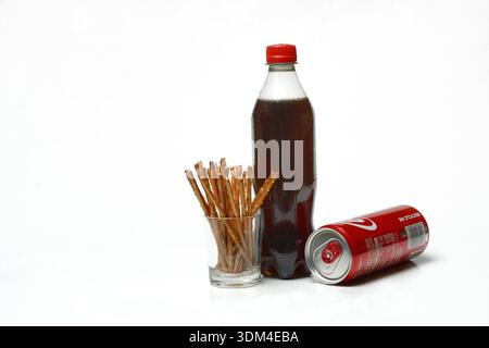 Pretzel sticks and cola Stock Photo