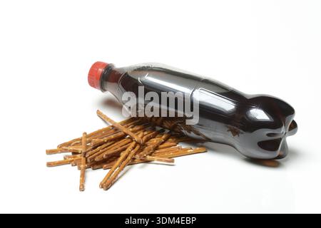 Pretzel sticks and cola Stock Photo