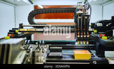 Automated pick and place machine installing electronic components on a circuit board Stock Photo