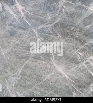 Painted marble texture in cool grey tones with fine white and light veining. The surface appears vivid and organic, crossed by flowing lines and delic Stock Photo