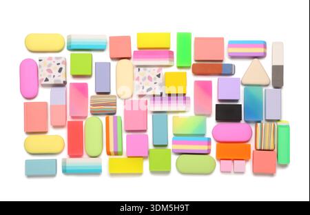 Many colorful rubber erasers on white background Stock Photo