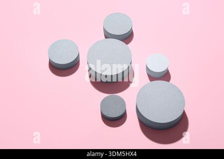 Set of round building blocks on pink background Stock Photo